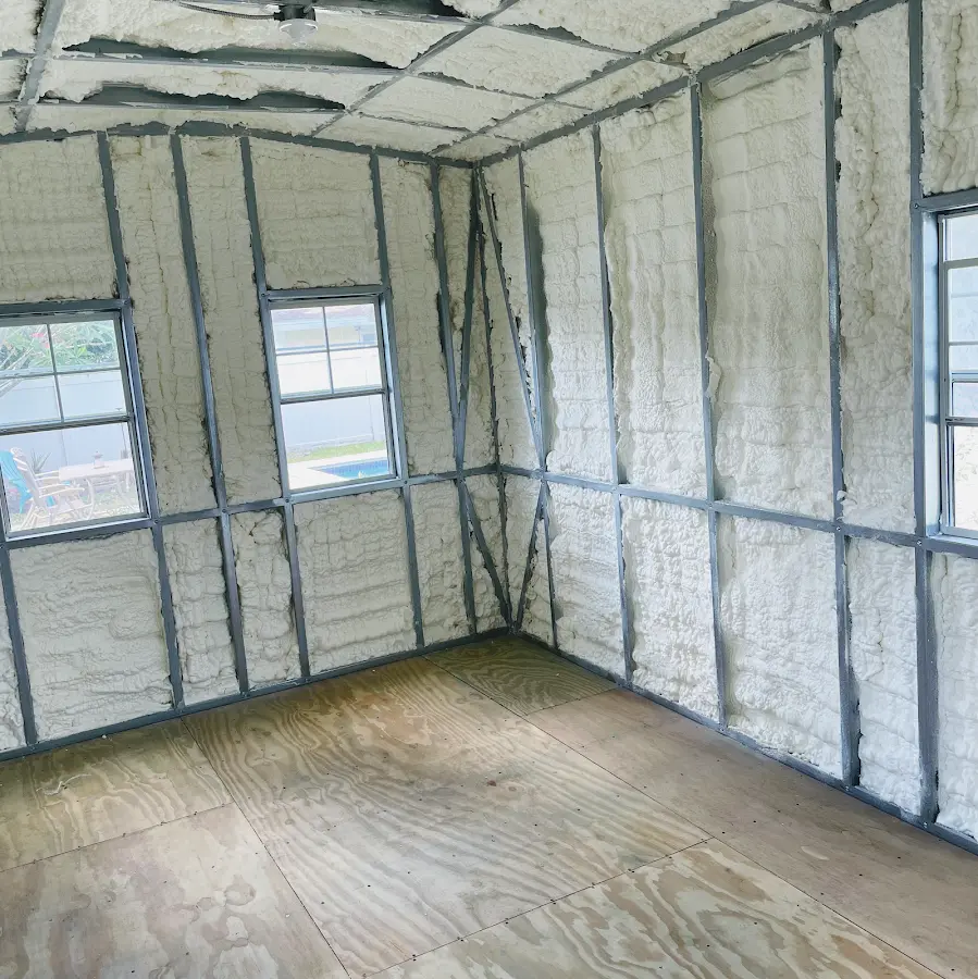 Closed-cell spray foam insulation applied to wall cavities in a residential project in College Park